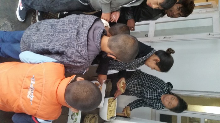 Sorry - what's the point of experimenting with all our weird European Christmas dishes when we know that the kids LOVE our pasta bolognese...! Dorje and Gita in action. 20141225_150705