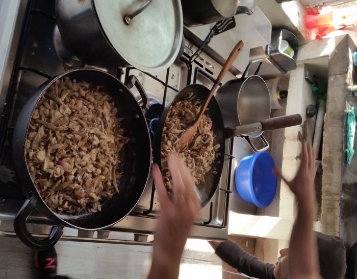In the kitchen next to our out-door Sausage Factory Annette is pimping up the ingredients for one of our vegetarian Christmas Dishes with her secret Mushroom Pate Mantra...